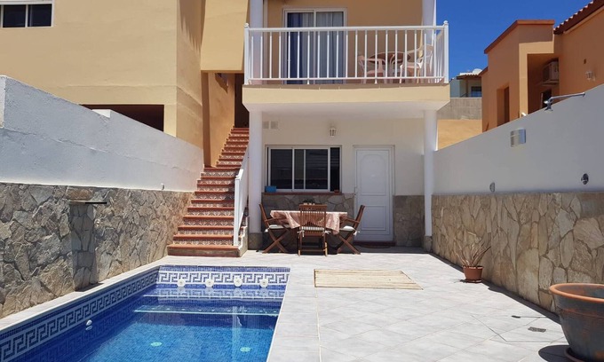 Tarajalejo Apartamento | Apartamento con piscina próximo a la playa