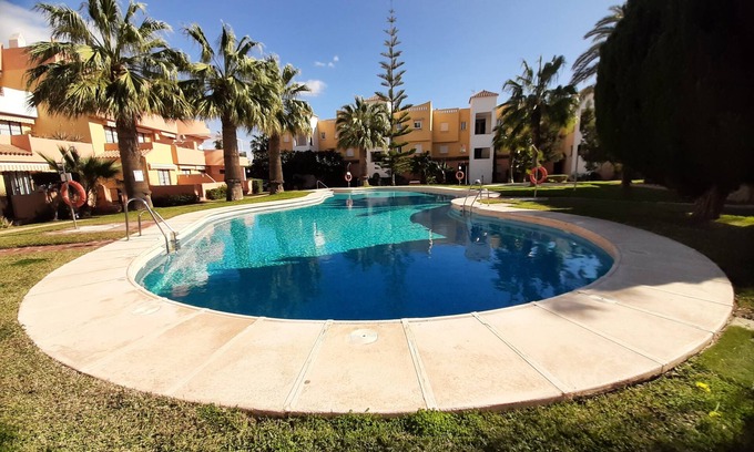 Playa de Vera Apartamento | APARTAMENTO CON PISCINA RESIDENCIA NATURISTA PLANTA BAJA