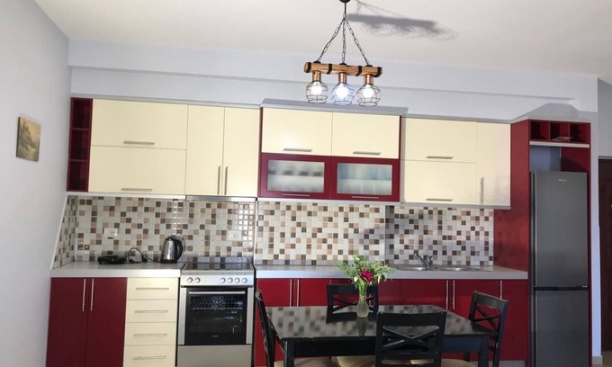 Qender Apartamento | Apartment with to bedrooms, to bathrooms, 3 balconies and living room/kitchen.