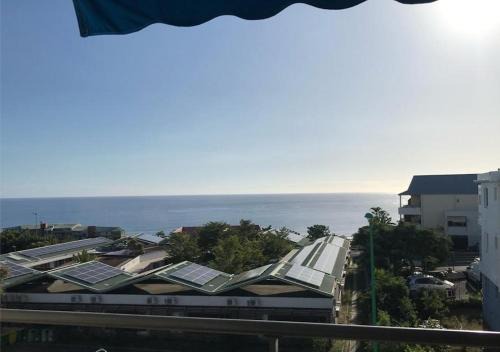 Carosse Apartamento | Appart sympa, vue sur le lagon à Saint-Gilles les bains