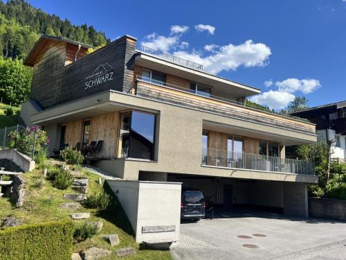 Alpendorf Apartamento | Appartement Schwarz