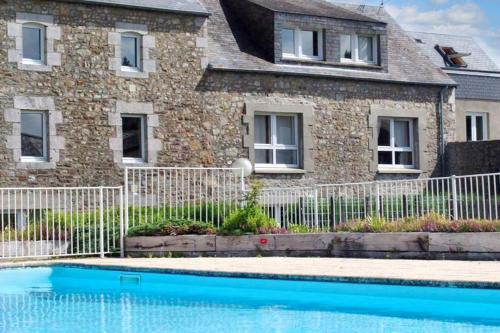 Montmartin-sur-Mer Apartamento | Appartement familial avec piscine à Montmartin-sur-Mer 54 m²