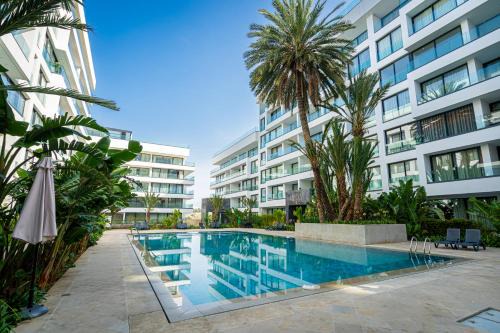 Malabata Apartamento | Appartement luxueux avec piscine - Malabata Hills - Proche de la plage et du célèbre parc Villa Harris - AC, WIFI, IPTV