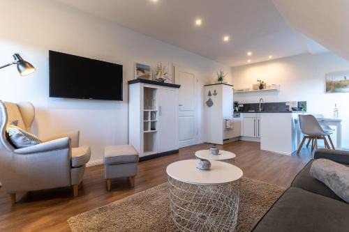 Tumlauer Koog Apartamento | Appartement unter Reet Diekkieker