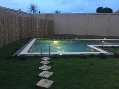 Lome Villa | Apries de Sais - villa de standing avec piscine