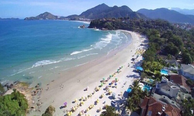 Praia Grande Apartamento | APTO BAMBU PISCINA BORDA INFINITA