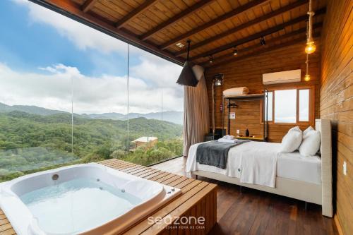 Anitapolis Apartamento | Apto c/lareira, jacuzzi e vista incrível - VST027