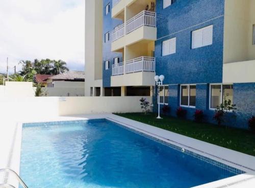 Indaia Apartamento | APTO FAMILIAR EM BERTIOGA JARDINS DO INDAIÁ A 500 M Praia