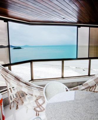 Barra Sul Apartamento | Apto frente mar Bal Camboriu pé na areia churrasqueira carvao na sacada fantástica e encantadora vista mar