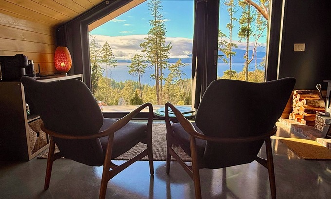Halfmoon Bay Cabina | Arbutus Ridge, a cozy, architecturally unique cabin surrounded by arbutus trees