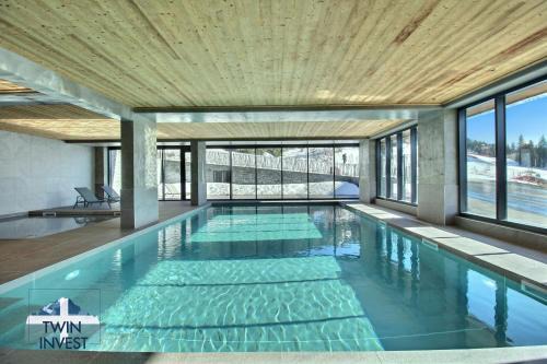 Arc-1600 Apartamento | ARC 1600, LE RIDGE, Appartement 07 personnes Vue Montagne - ski aux pieds - Sauna, Hammam, Piscine, Salle de salle de sport-fitness