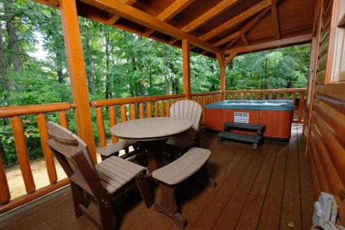 Chalet Village Casa | Arcade game, hot tub, spacious beautiful log cabin! Gatlinburg log cabin!