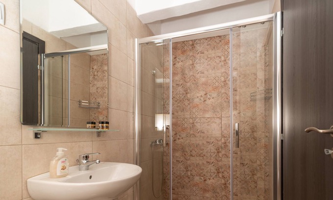 Karavostasi Apartamento | Artemis -Traditional stone built studio apartment