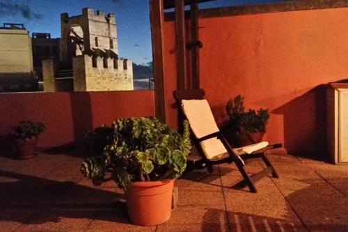 Oristano Apartamento | Attico in centro con vista della torre - Cozy penthouse facing to the tower