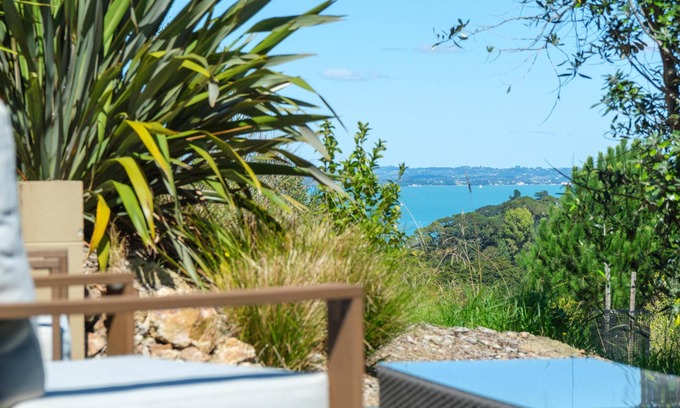 Palm Beach Cabina | Awaawa Yurts - Rangi Yurt - Awaawa Yurts offer a luxury glamping experience on Waiheke Island. Stunning views, luxury queen sized bed, private bathroom with tea and coffee making facilities.