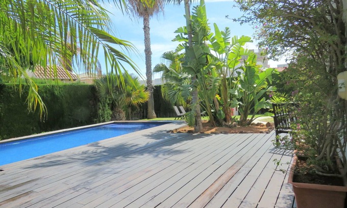 Daimuz Casa | Casa AZAHAR. COSTA VALENCIANA, COSTA BLANCA. Jardín, piscina, playa .