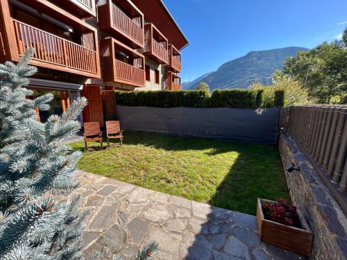 Benasque Apartamento | B49 - Bajo con Jardín Peguera - Villmor