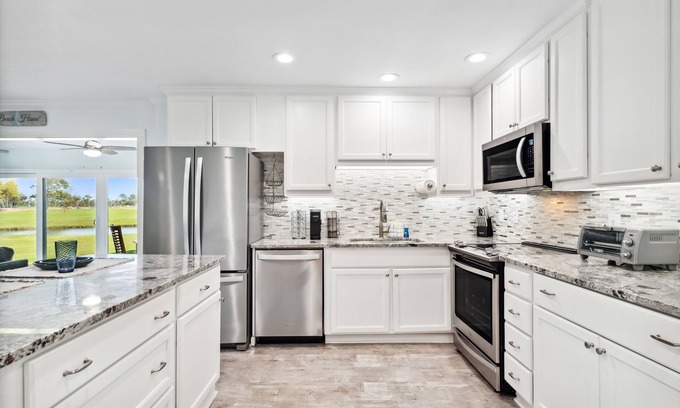 Upper Grand Lagoon Condominio | Bay Point Golf Villas by Book that Condo