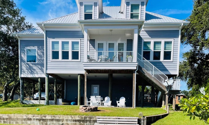 Navarre Casa | Bayfront home with private pier, boat moorage, patio, & amazing water views