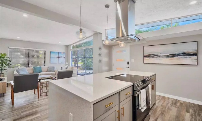 Bayshore Gardens Casa | Bayshore Gardens remodel with hot tub + fire pit + walk to park and marina