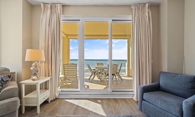 Ono Island Condominio | Beach Colony Tower 5B: unidad frente a la playa con una gran terraza y vistas increíbles.