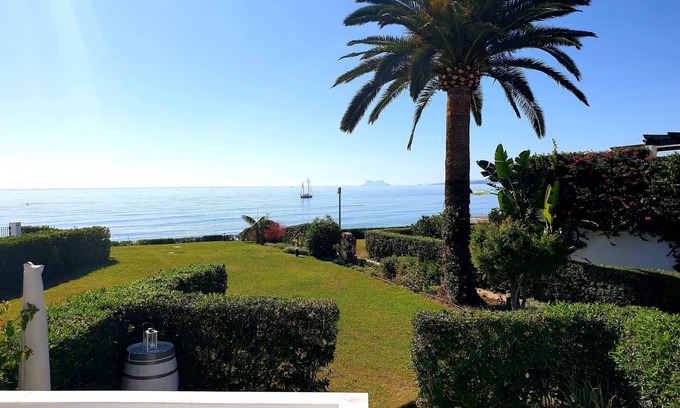 Nueva Milla de Oro Villa | Villa frente a la playa, impresionantes vistas, acceso directo a la playa, cerca de todas las comodidades.