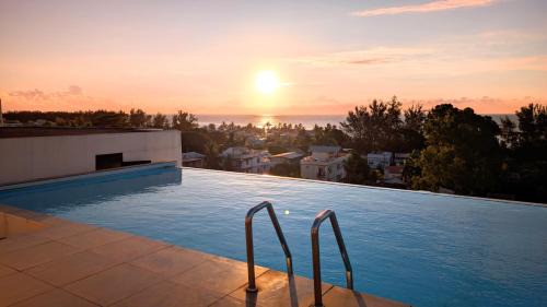 Flic-en-Flac Apartamento | Beach house apartment with pool