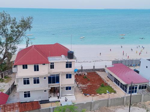 Uroa Apartamento | Beachfront Bliss 2BR Master Suites with Balcony, AC Free WiFi Uroa Zanzibar