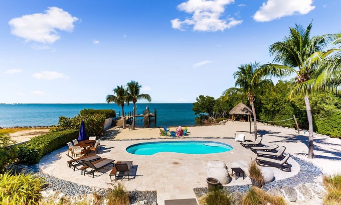 Bowens Addition Casa | Beachfront charmer with dock, furnished balcony, firepit, & W/D - dog-friendly