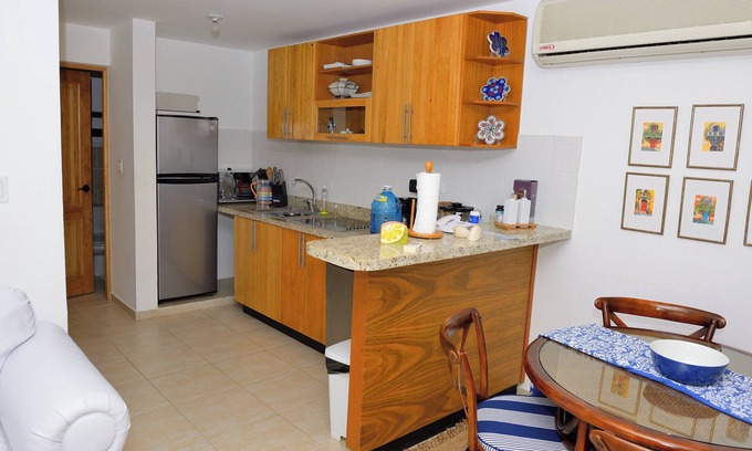 Dominicus Condominio | Beachfront Bliss: Cozy 2-Bedroom Rental Sleeps 4-6 with the sand 10 meters away