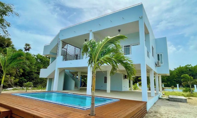 Caribbean Way Villa | Beachfront Home w/ Pool, Volleyball & Rooftop View