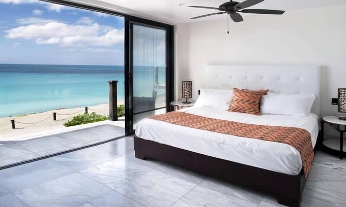 Fryes Beach Villa | Casa adosada moderna frente a la playa en Ffryes Beach