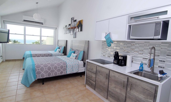 Jobos Apartamento | Beachfront Modern Loft with Large Private Terrace