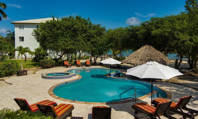 Cocoplum Villa | Beachfront-Villa-Family Fun-Pool & Hot Tub-Dock