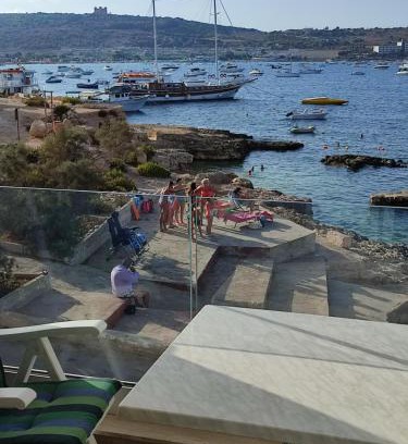 Għadira Apartamento | BEACHFRONT with Seaviews Apartment No56 Award Winner Unbeatable Location for Closeness to the Sea Ideal for Guests looking for Winter Spring and Autumn Breaks in Sunny Malta Also Ideal for Coastal Hikers