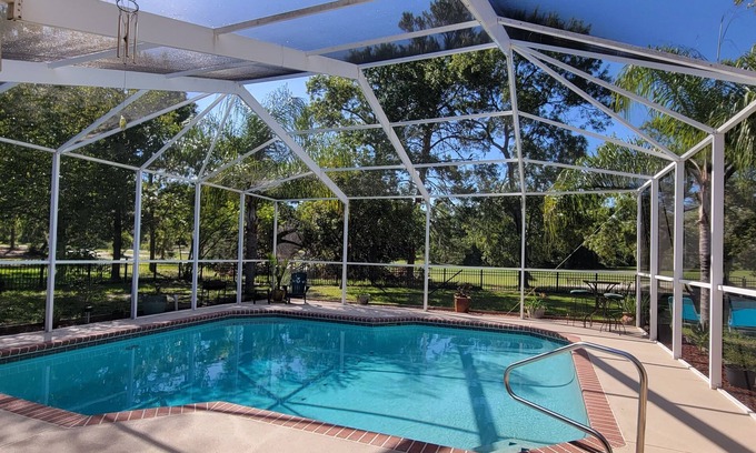 Spring Hill Casa | Beautiful 4 BR-2.5 Bath-Office-Golf Course-Pool-Hot Tub-Sleeps 9-Dog Friendly!