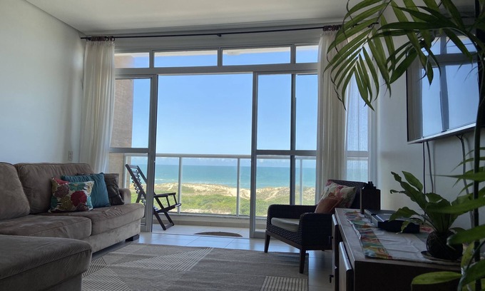 Lagoa Pequena Apartamento | Lindo apartamento frente al mar con vistas a la playa - 3 suites para 8 personas