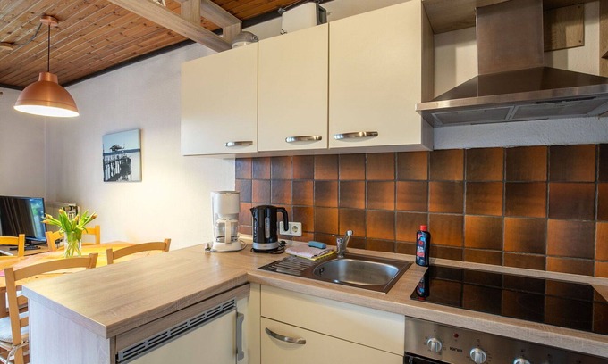 Friedrichskoog Apartamento | Acogedor apartamento para 4 personas con WIFI, TV, terraza y aparcamiento