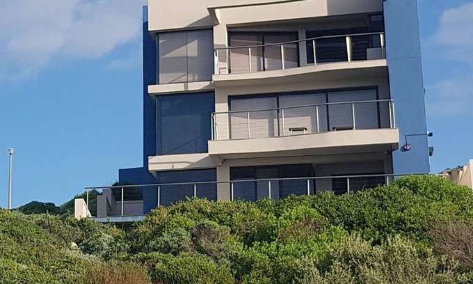 Gansbaai Apartamento | Acogedor apartamento para 4 personas con WIFI, piscina, TV, terraza y aparcamiento