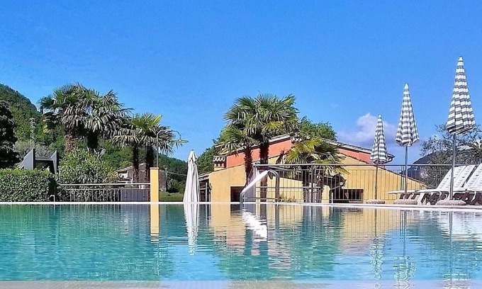 Garda Apartamento | Beautiful apartment for 4 people with A/C, pool, WIFI, TV, patio, panoramic view and parking