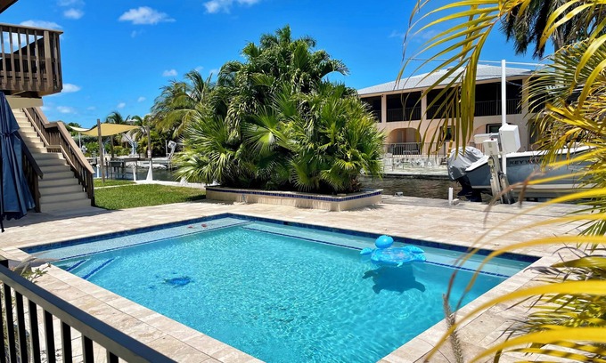 Whispering Pines Casa | Beautiful Canal Front Heated-Chilled Pool 4 Bdr Home. Sep-Oct-Nov 2025 Available