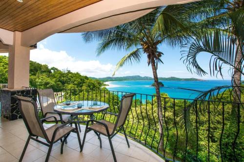 Playa Flamingo Casa | Beautiful Condo in Peaceful Cliffside Location with a Private Balcony & Stunning Ocean and Mountain Views