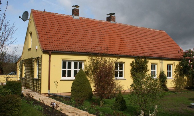 Usedom Casa | hermoso jardín con idilio del pueblo en la laguna