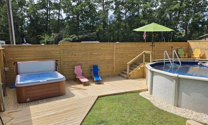 Peletier Casa | Beautiful home with a private Hottub and Pool, only three miles from Emerald Isle Beach