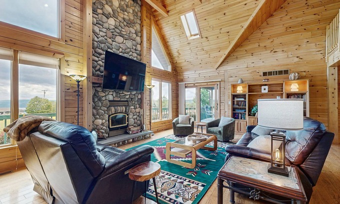 Dundee Casa | Beautiful lake view home with decks, grill, soaking tub & fireplace
