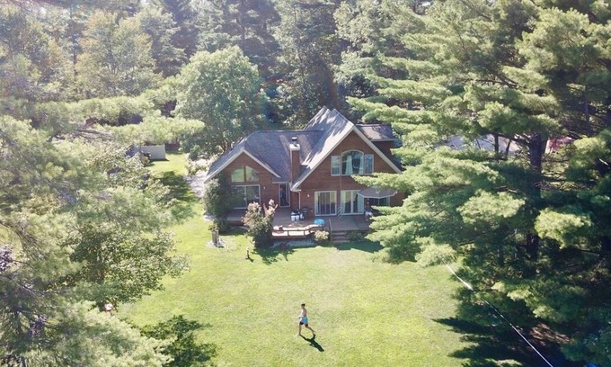 Gaylord Casa | Beautiful lakeside home with private beach, access to golf, skiing, shopping.