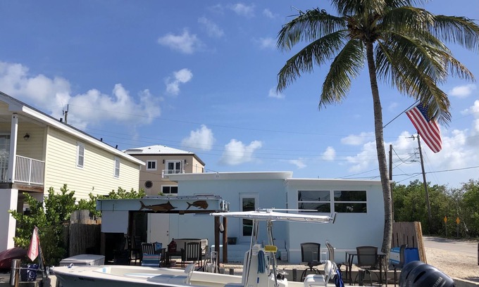 Key Largo Village Casa | Beautiful Remodeled Home on the Water! 40 ft dock & short walk to private beach!