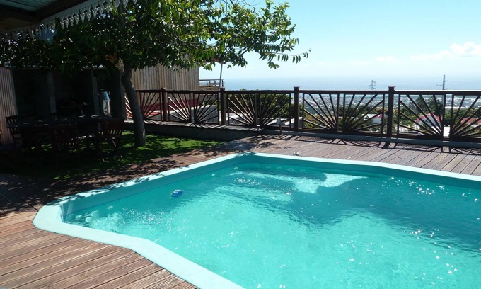 Sainte-Clotilde Casa | Hermosa villa con vista al mar, bien equipada y amueblada, piscina segura, sala de juegos.