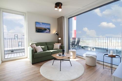 Marienleuchte Apartamento | BeltBlick 11 – Ferienwohnung mit unverbautem Meerblick & Dachterrasse!