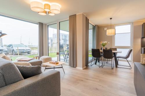 Marienleuchte Apartamento | BeltBlick 20 - Moderne Ferienwohnung direkt an der Ostsee mit Meerblick & Sauna!